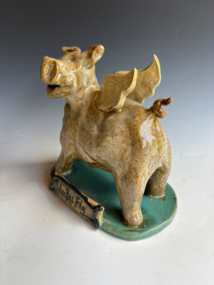 7" tall When Pigs fly sculpture by Crystal King