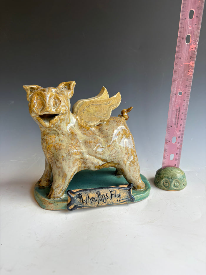 7" tall When Pigs fly sculpture by Crystal King
