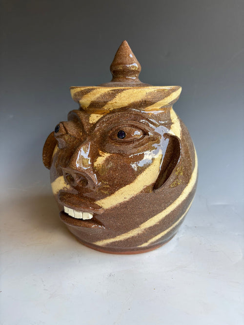 8" Walter Fleming Face Jug swirl Canister