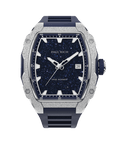 Paul Rich watch with frosted silver bezel, blue aventurine dial, date window, and blue rubber strap, in a tonneau-shaped case.