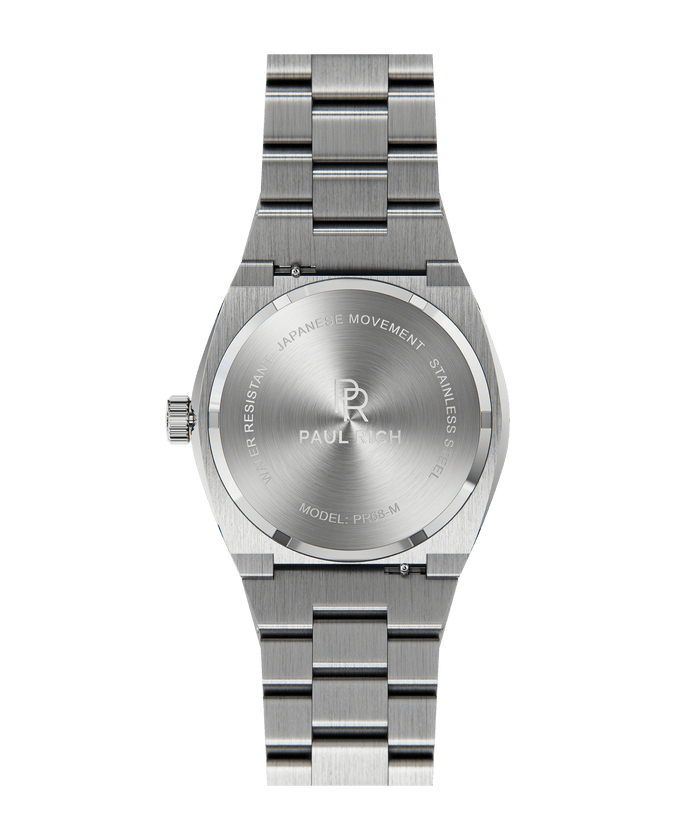 Back view of Paul Rich brushed silver watch with engraved case back showing logo, model PR68-M, and Japanese movement.