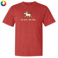 Red t-shirt with a dog graphic and 'be your own dog' text on a white background