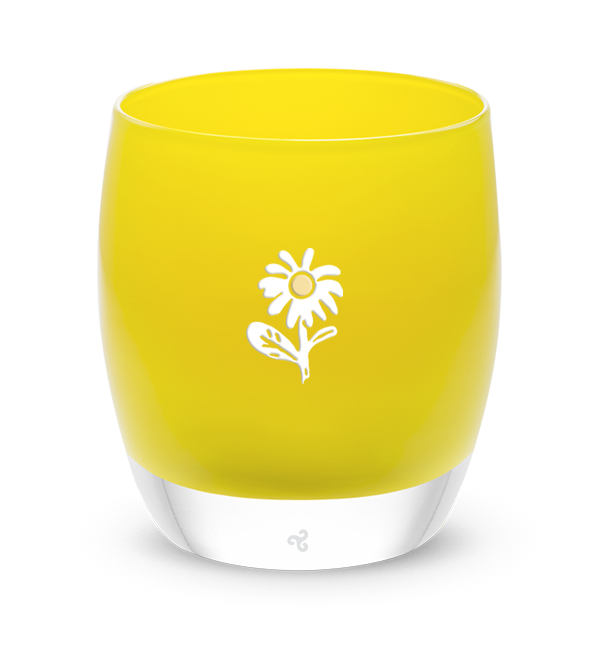 bloom yellow glassybaby with white flower etched on it sitting on wood shelf