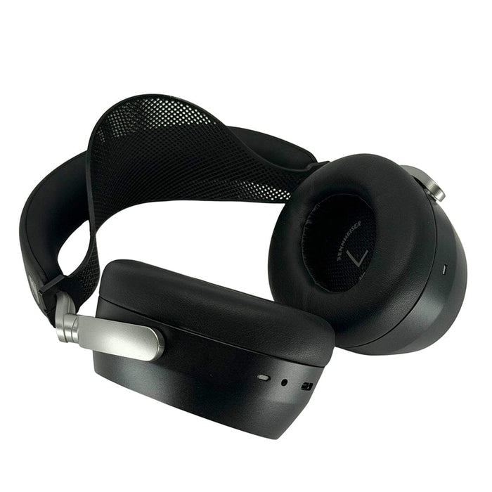 The Capra Comfort Strap by Capra Audio for Sennheiser HDB 630 headphones is shown here with black over-ear wireless headphones featuring silver accents, cushioned ear cups, and a mesh headband, set against a white background.