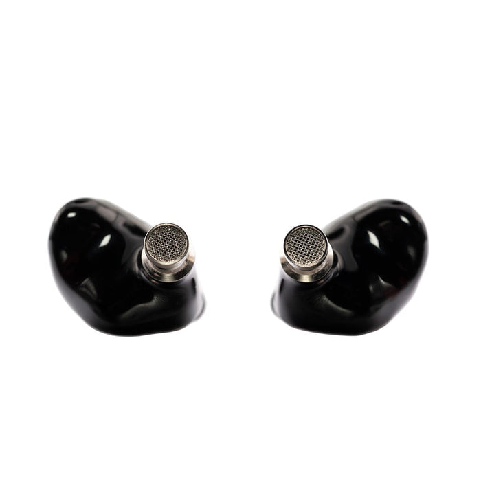 A pair of Crinear Daybreak In-Ear Headphones features metallic mesh speaker grills and a black finish, positioned symmetrically on a white background, offering audiophile-grade sound quality.