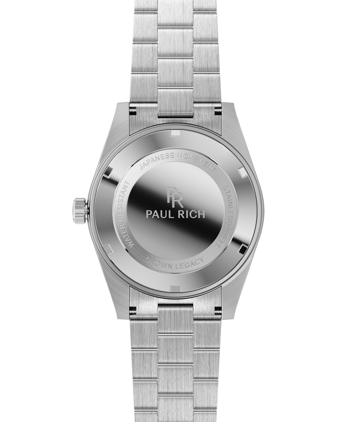 Stainless-steel watch case back with engraved text and logo, brushed bracelet links, and a silver crown.
