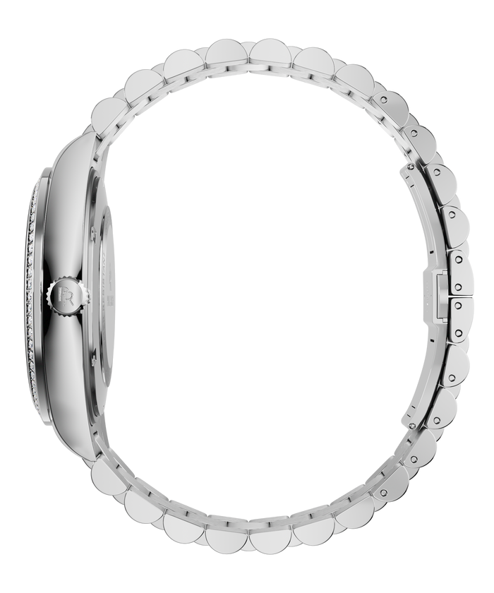 Side view of a silver watch with a stainless-steel bracelet, a gem-set bezel, and a silver crown engraved with the PR logo.