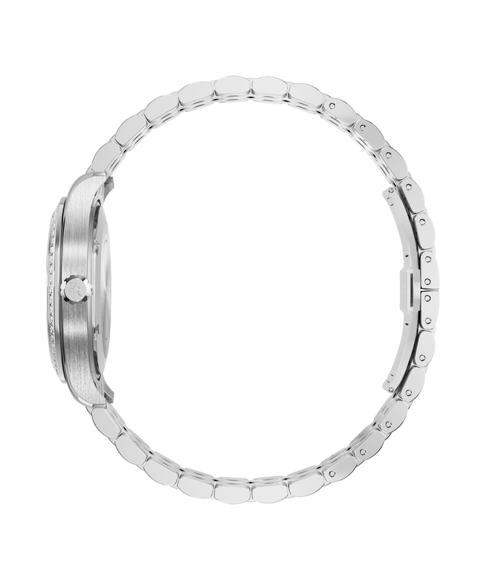 Side view of a silver-tone Paul Rich watch with a gem-set bezel, engraved crown, and a fully closed rounded link bracelet.