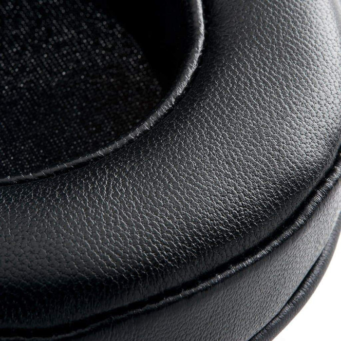 Close-up of Dekoni Audio Elite Sheepskin Ear Pads for Focal—black, textured replacement cushions with visible stitching and fabric inner lining—ideal for upgrading your Focal headphones.