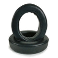 Two black, round Dekoni Audio Replacement Earpads for Focal Bathys, Bathys MG, Hadenys, Azurys & Lensys are shown—one standing upright inside the other—ideal for upgrading your headphones. Isolated on a white background.