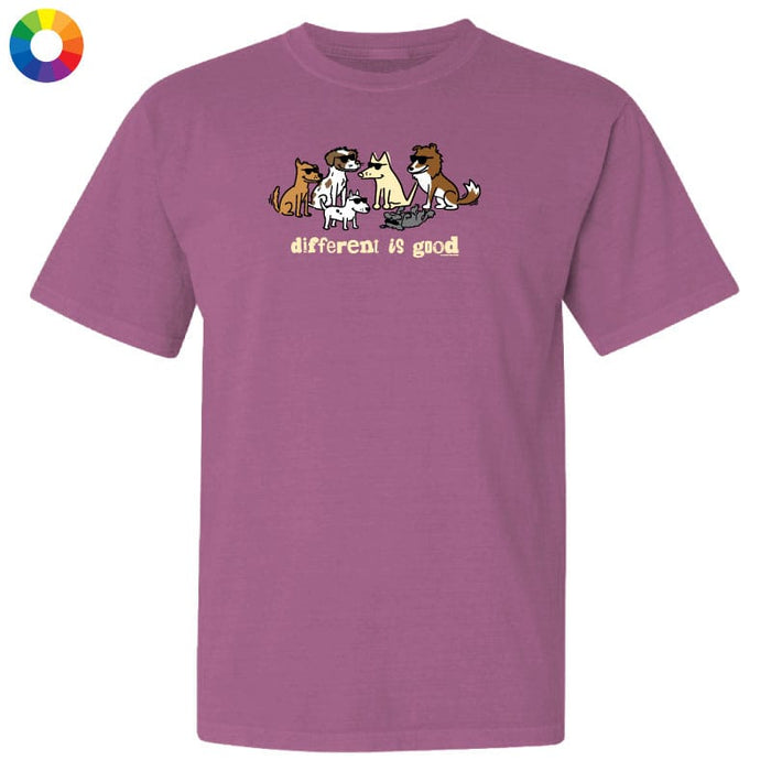 Purple t-shirt with cartoon dogs and 'different is good' text on a white background