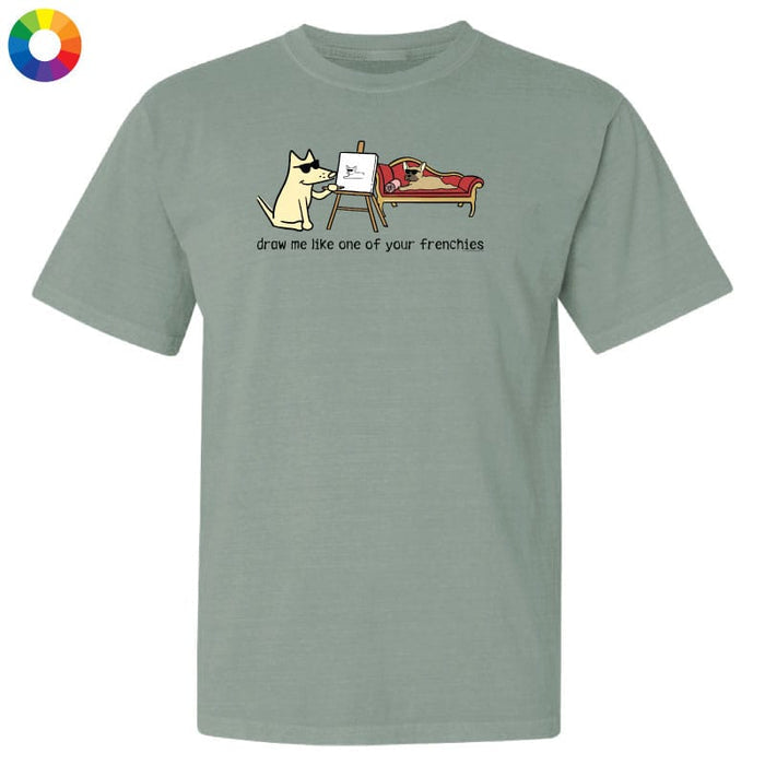 Green t-shirt with a cartoon dog graphic and text on a white background