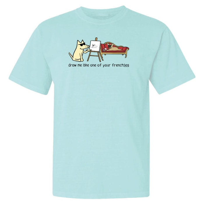 Light blue t-shirt with a cartoon dog graphic and text on a white background