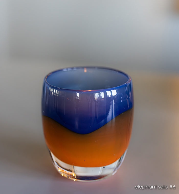 elephant solo #6 navy/orange hand-blown glass candle holder.