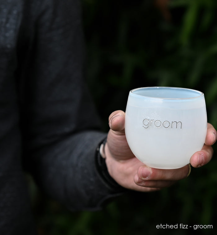 fizz white, hand-blown drinking glass, etched with the word groom