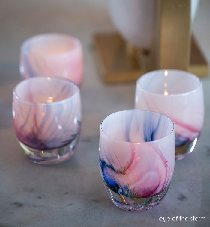 eye of the storm, multicolor texture moving through light lavender, hand-blown glass votive candle holder