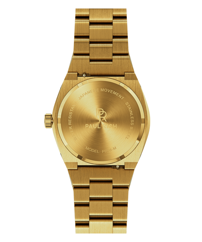 Back of Paul Rich watch with brushed gold stainless steel case and bracelet, showing engraved PR logo and text including “MODEL: PR68-M” and “JAPANESE MOVEMENT.”