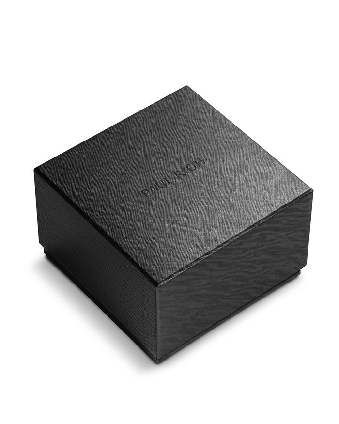 Closed black Paul Rich watch box with embossed logo, textured finish, and square shape.