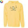 A pale yellow pullover hoodie with a front kangaroo pocket and a graphic of a dog with the text 'go with the flow' on the chest. A small multicolor color wheel icon is in the top-left corner.