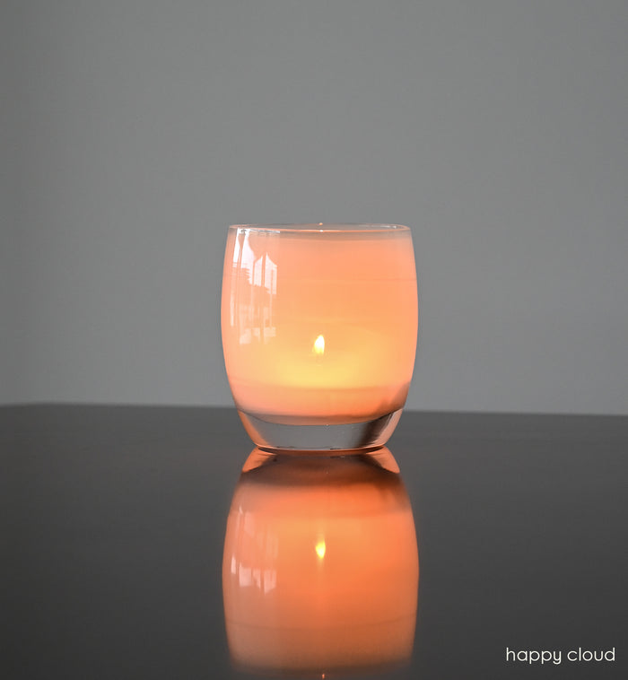 happy cloud light grey hand-blown glass votive candle holder.