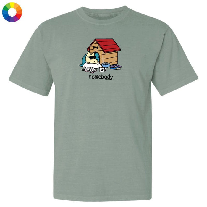 Green t-shirt with a graphic of a dog and doghouse labeled 'homebody' on a white background.