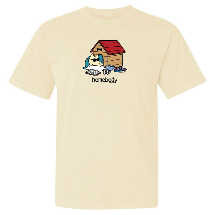 Beige t-shirt with a graphic of a dog by a doghouse and the word 'homebody' on a white background