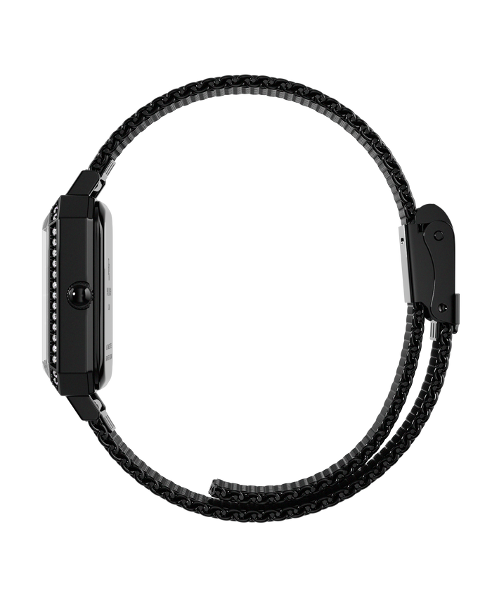 Side view of a black Paul Rich watch with gem-set octagonal case and black mesh strap, fully closed in a circular position.
