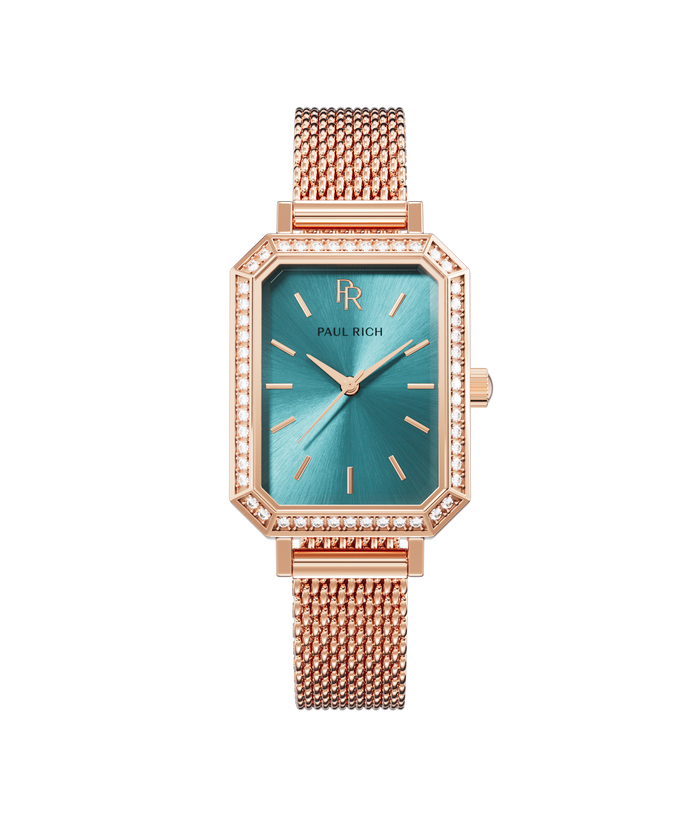Front view of a rose gold Paul Rich watch with an emerald green sunray dial, gem-set octagonal bezel, and rose gold mesh strap.