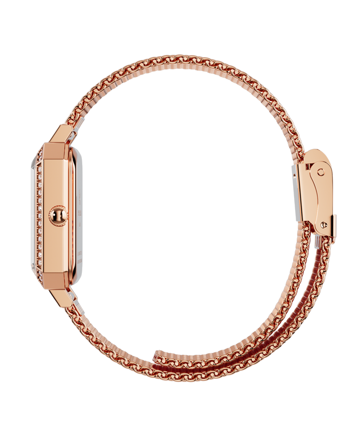 Side view of a rose gold Paul Rich watch with a slim gem-set octagonal case and fine mesh strap, shown fully closed in a circular position.