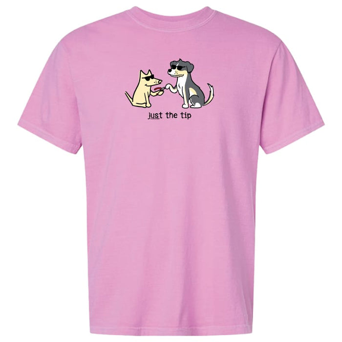A pink short-sleeve crewneck t-shirt featuring a cartoon graphic of a yellow cat and a black-and-white dog wearing sunglasses and holding a glass, with the text 'just the tip' printed below them.