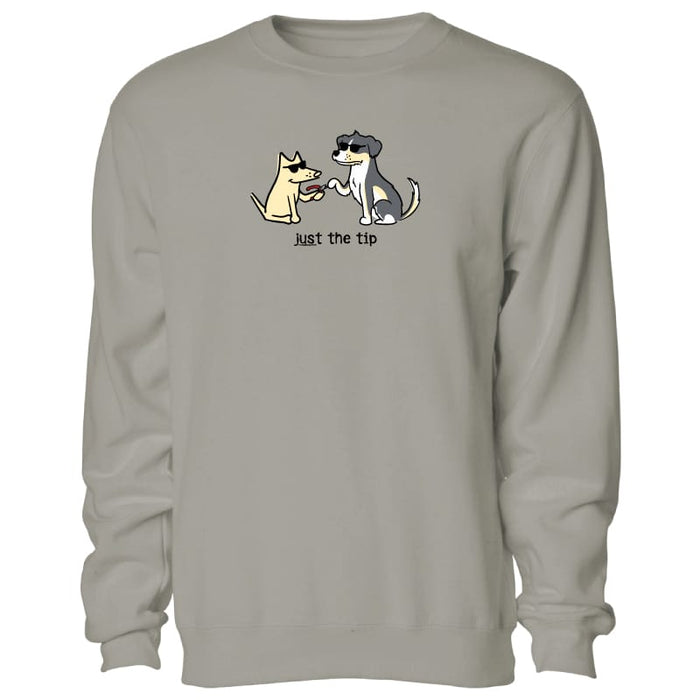 A light gray crewneck sweatshirt featuring a cartoon graphic of a yellow dog and a black-and-white cat sitting next to each other with the text 'Just the tip' printed below.