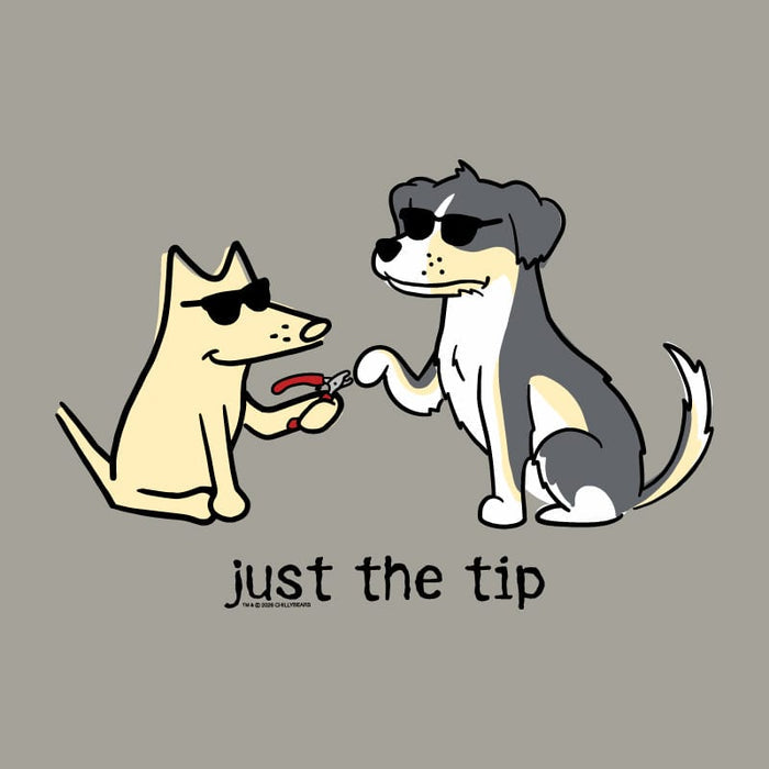 A cartoon-style graphic on a plain taupe background showing two dogs wearing sunglasses while one dog receives nail clippers. Below the illustration, the text reads 'just the tip'.