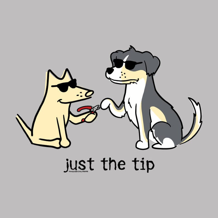A cartoon-style graphic on a light gray background showing two dogs wearing sunglasses, with one dog holding nail clippers and the other dog pawing at the tip. Below the illustration is the text 'just the tip' in black lowercase letters.