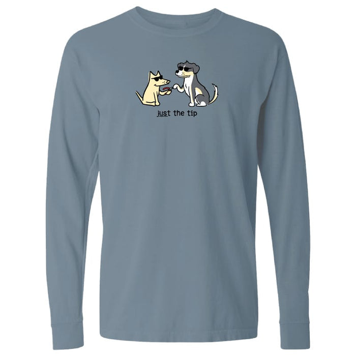 A dusty slate blue long-sleeve t-shirt with a graphic of two cartoon dogs wearing sunglasses and the text 'just the tip' printed on the chest, displayed on a solid white background.