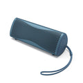 The KEF Muo HiFi Portable Bluetooth Speaker by KEF is a sleek blue, cylindrical, waterproof speaker with a perforated grill and matching wrist strap, displayed on a plain white background.