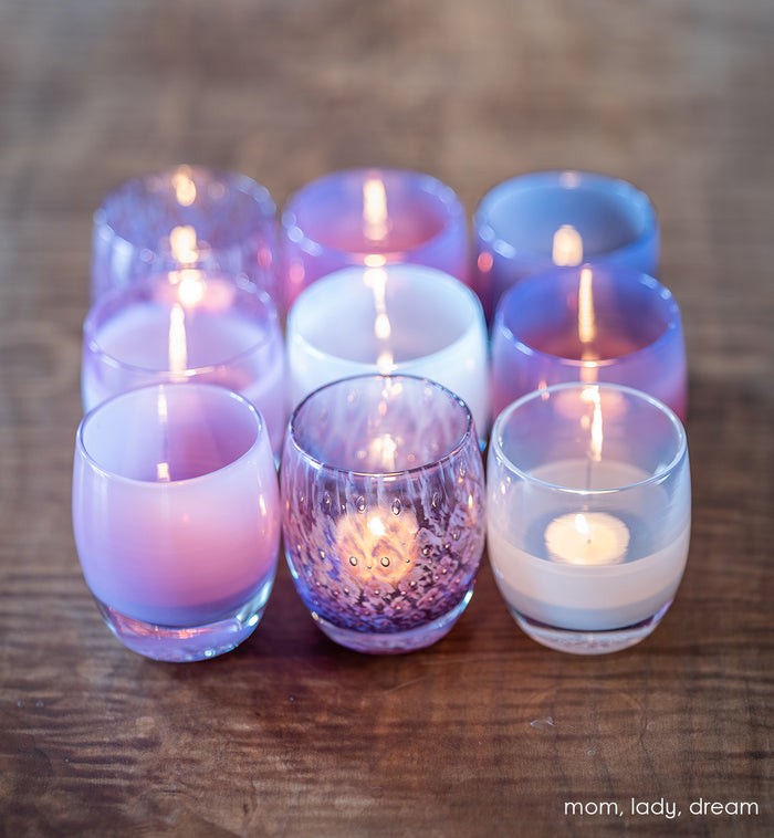 lady purple bubble, hand-blown glass votive candle holder. paired with mom and dream on a cube display on wood table.