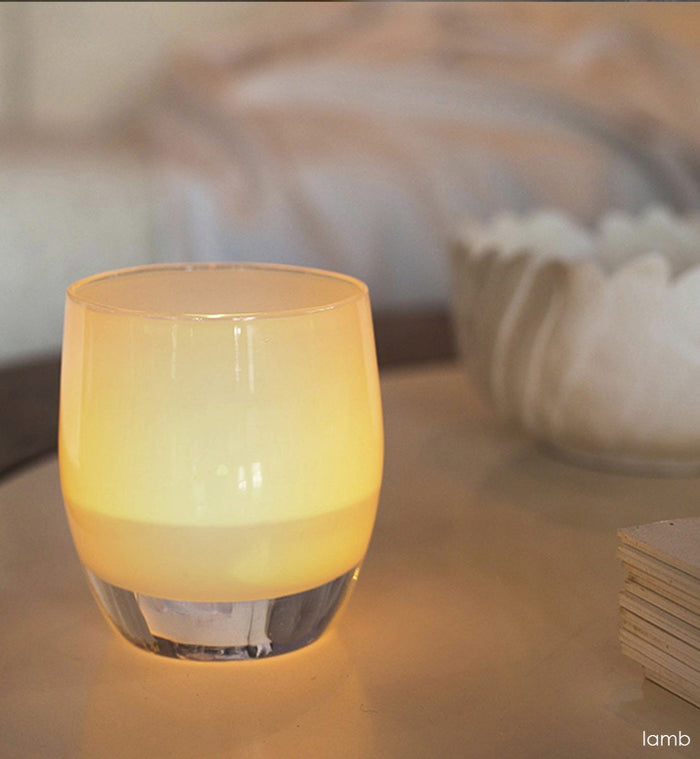 lamb soft beige hand-blown glass votive candle holder.