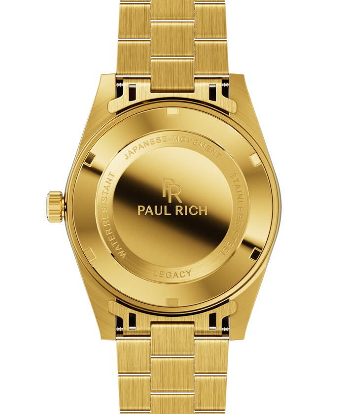 Back view of a gold-tone Paul Rich watch engraved with “Paul Rich,” “Japanese Movement,” “Stainless Steel,” “Water Resistant,” and “Legacy,” shown with a gold link bracelet.