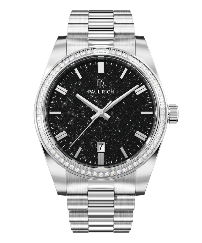 Silver wristwatch with a black aventurine dial, crystal-set bezel, silver hour markers, and metal bracelet shown on a transparent background.