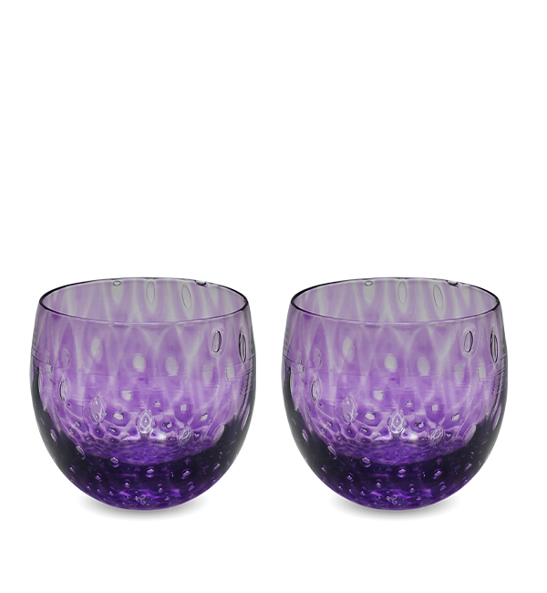love potion #8 is a deep purple hand-blown drinking glass with a bubble pattern.