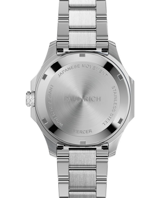 Back view of Paul Rich watch with brushed silver caseback engraved with "PAUL RICH", "MERCER", "JAPANESE MOVEMENT", and "STAINLESS STEEL".