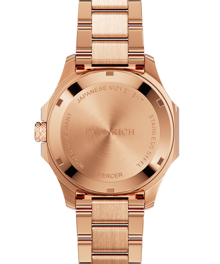 Back view of Paul Rich watch with brushed rose gold caseback engraved with “PAUL RICH,” “MERCER,” “JAPANESE MOVEMENT,” and “STAINLESS STEEL.”