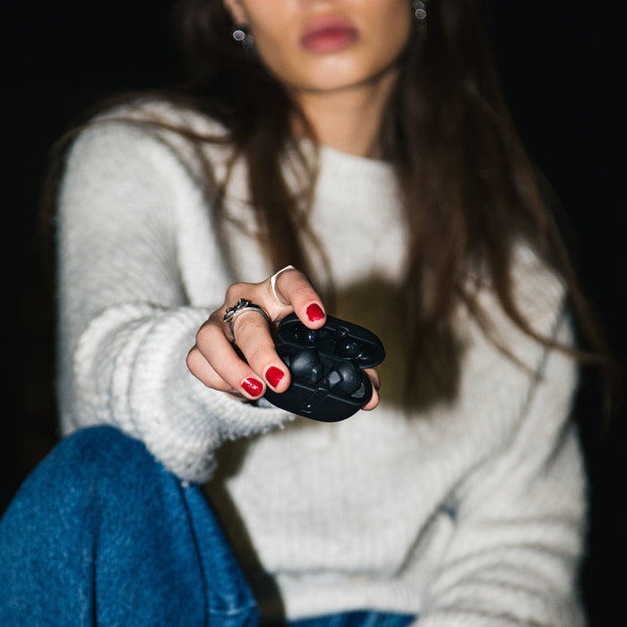 Mojo 800 held by woman wearing white sweater