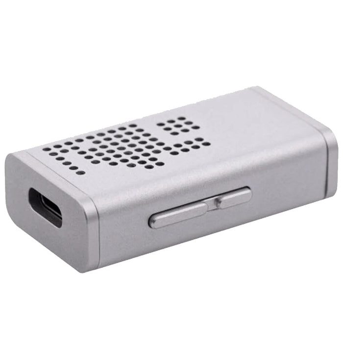The Moondrop Dawn Pro Portable DAC and Headphone Amp by Moondrop is a compact, rectangular silver device with ventilation holes, two side buttons, and a USB-C port for high-resolution audio on the go.