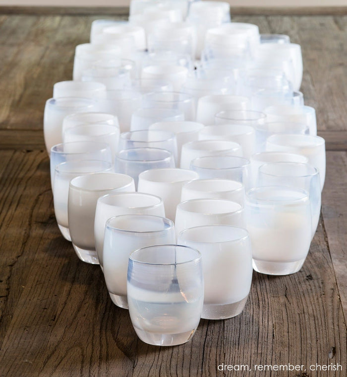 remember soft white hand-blown glass votive candle holder. Paired with dream and cherish.