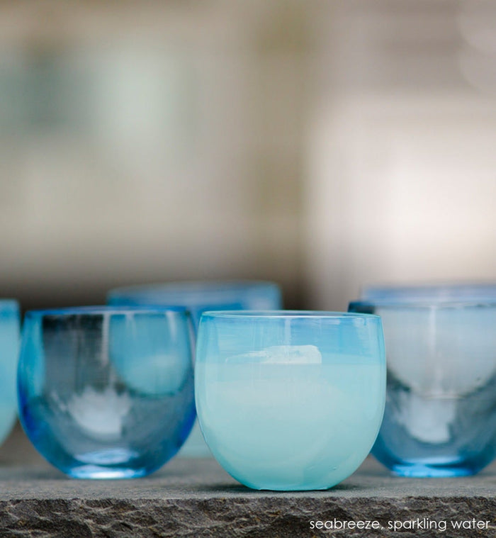 seabreeze drinker, light blue hand-blown drinking glass. Paired with sparkling water drinker.