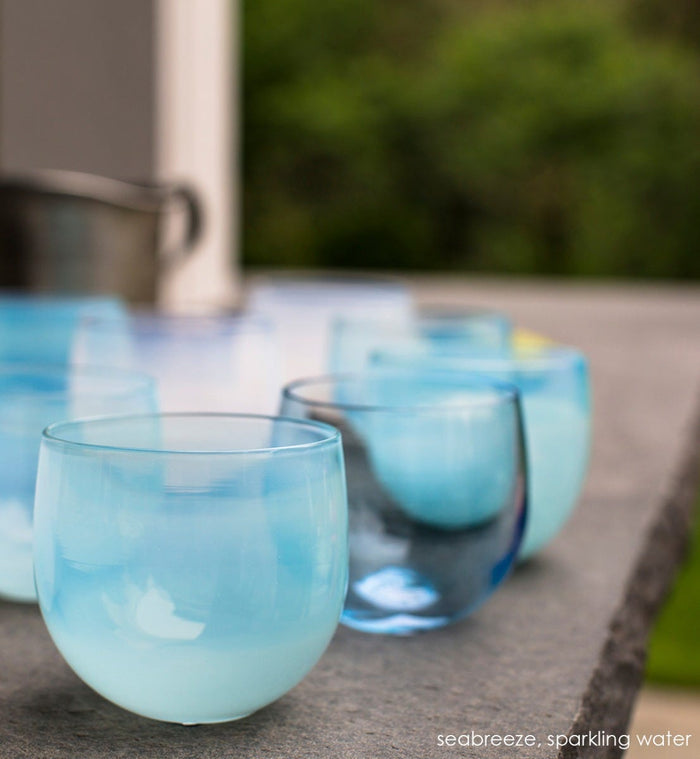 seabreeze drinker, light blue hand-blown drinking glass. Paired with sparkling water drinker.
