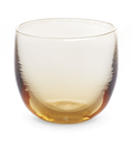 single malt drinker, transparent light amber hand-blown drinking glass.