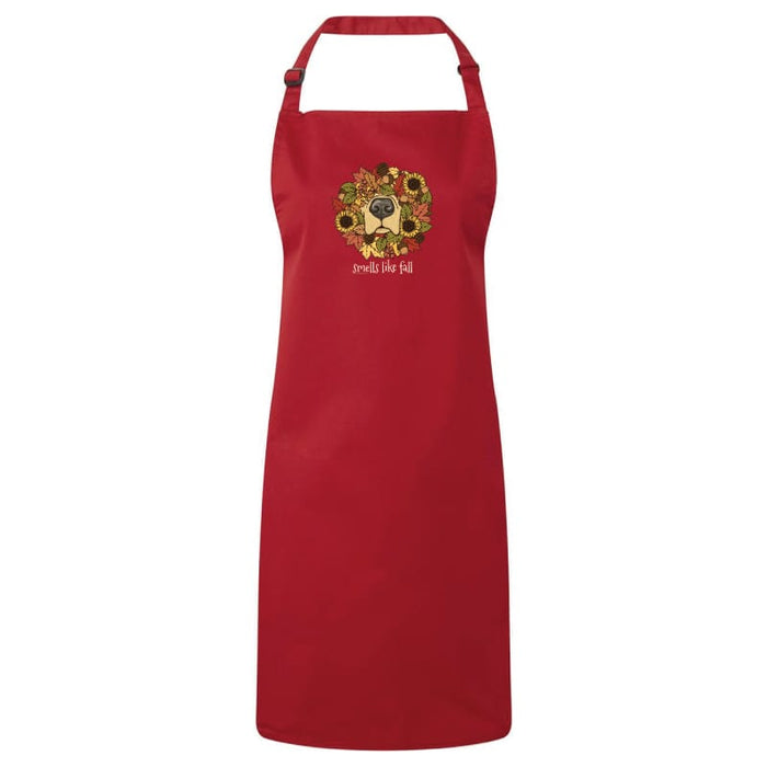 A red bib apron with a neck strap and waist loop, featuring a central graphic of a golden retriever surrounded by sunflowers and the text 'JERSEY RETRIER' underneath, shown against a plain white background.
