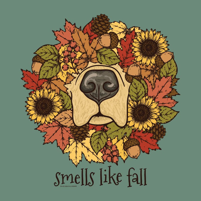 A circular autumn wreath illustration featuring a dog nose in the center, surrounded by sunflowers, fall leaves, acorns, pinecones, and berries, with the text 'smells like fall' below on a muted green background.